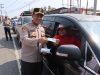 Antisipasi Dampak Kabut Asap Karhutla, Polres Pasaman Barat Turun ke Jalan Bagikan Masker